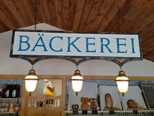 New sign that was "distressed" to appear old